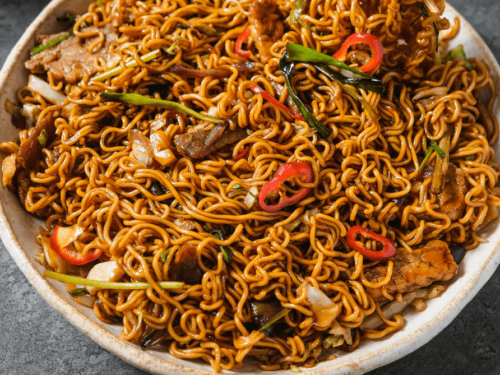 Mie Goreng: Stir-Fried Noodles with Vegetables and Chicken